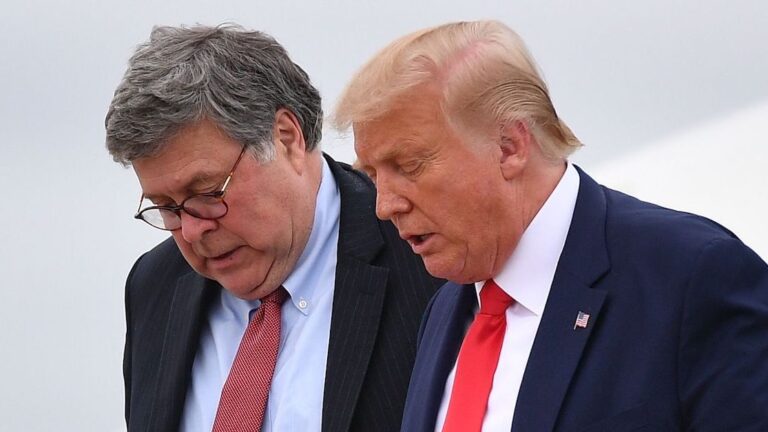 US President Donald Trump (R) and US Attorney General William Barr step off Air Force One upon arrival at Andrews Air Force Base in Maryland on September 1, 2020. - US President Donald Trump said September 1, 2020 on a visit to protest-hit Kenosha, Wisconsin that recent anti-police demonstrations in the city were acts of 