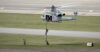 U.S. Marines jump from a helicopter during an air show at Marine Corps Air Station Cherry Point.