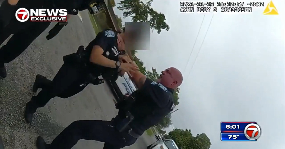'Don't ever f—ing touch me': Cop who grabbed female officer by throat for pulling him off handcuffed suspect won't face a jury
