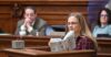 Jessica Rowley holds up the book "Let's Talk About it: The Teen's Guide to Sex, Relationships and Being Human" as an example of obscene material that should not be legally protected by public libraries and schools during a public hearing on proposed obscenity legislation at the West Virginia State Capitol in Charleston, W.Va., on Wednesday, Jan. 24, 2024. (Perry Bennett/West Virginia Legislative via AP)