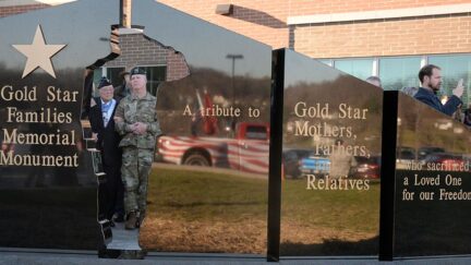 Congressional Medal of Honor recipient Hershel Williams and Maj. Gen. James Hoyer, as they look at the newly unveiled Gold Star Families monument Saturday, Dec. 5, 2015, in Fairmont, W.Va. (Tammy Shriver/Times West Virginian via AP) THE EXPONENT OUT; THE DOMINION-POST OUT; MANDATORY CREDIT