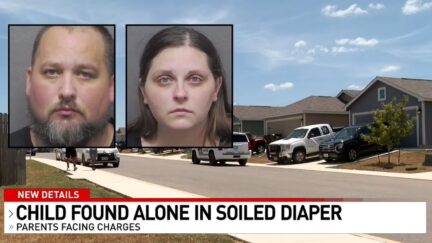 Couple arrested after 2-year-old was found roaming street alone
