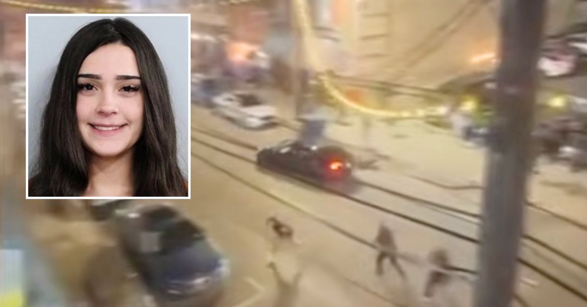 Woman drives over curb into crowd of people then begins 'dancing' for someone videotaping her: Police
