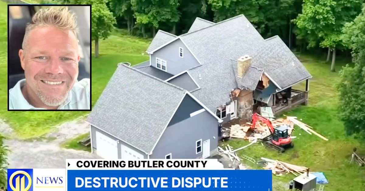 'If it's over, I'll tear the house down': Man returning home to his wife saying she's 'done' begins demolishing house with excavator as his family is inside, cops say