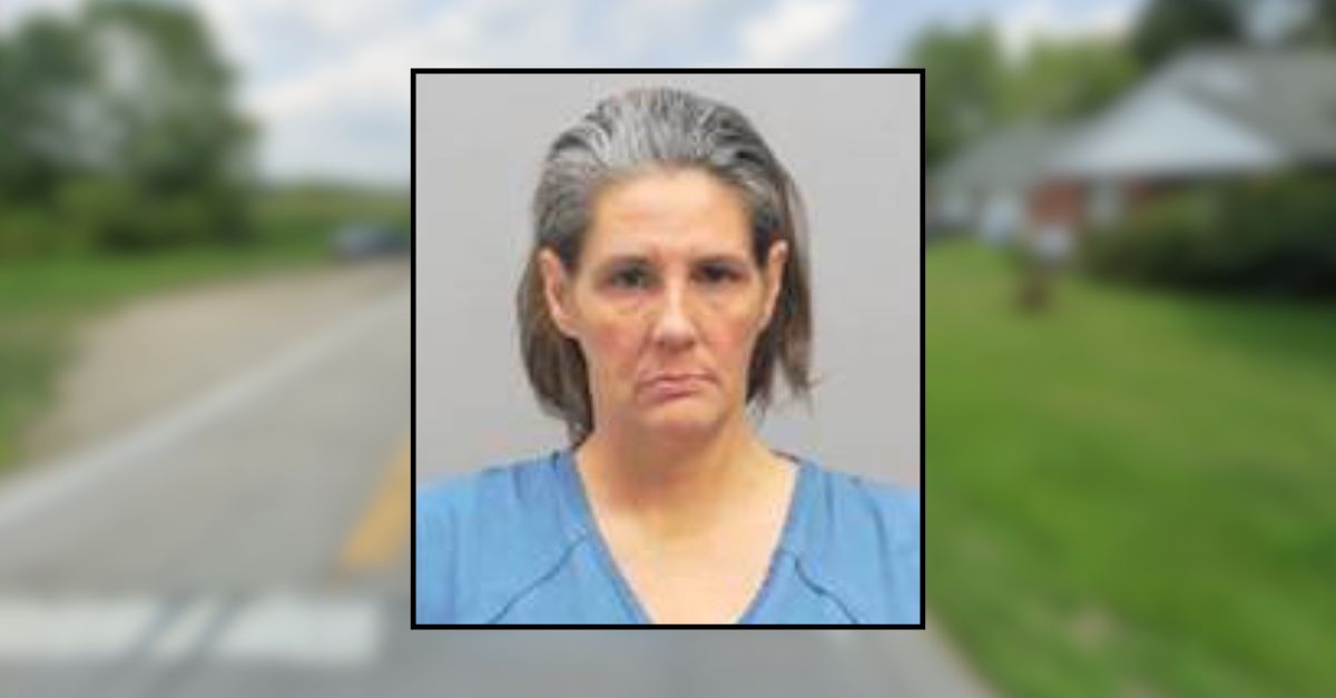 'Burn this place down': Woman fires gun and sets a home on fire to 'make a point,' police say