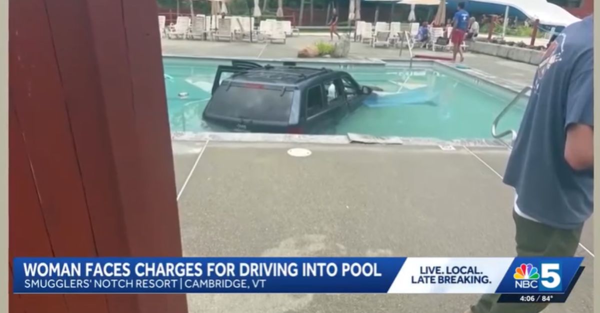 Swimmers sent scrambling after driver smashes Jeep through fence into resort pool: Cops