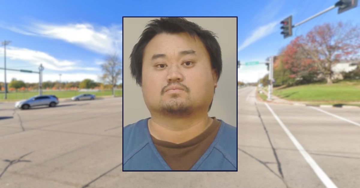 Driver responds to woman honking at him by pinning her arm in her own car door as she tried to drive away: Cops